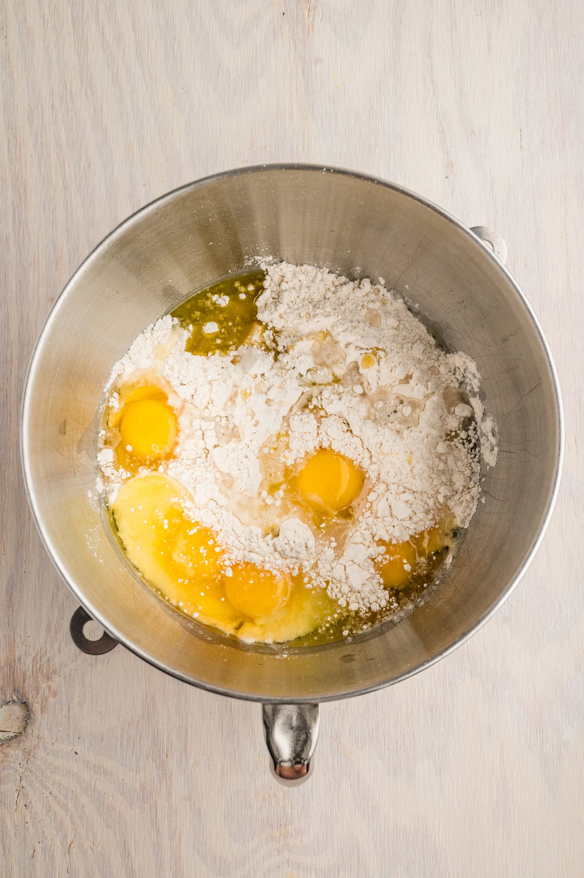 This Butternut Squash Ravioli Recipe is like a little slice of heaven made with fresh homemade dough and a mascarpone and butternut squash filling. Dough ingredients in a bowl.