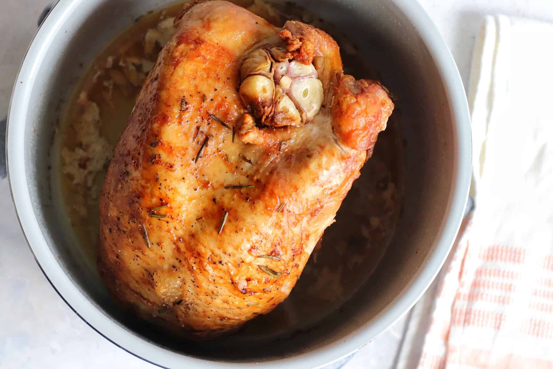 Air Fryer Turkey Breast is an amazing way to enjoy this moist and tender meat for Thanksgiving, Christmas or any Sunday Supper. Overhead picture of golden air fryer turkey breast in the air fryer.