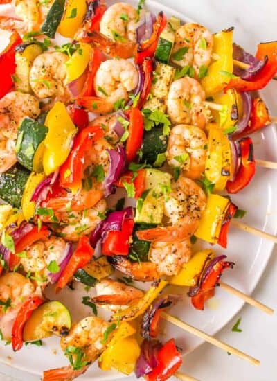 Overhead shot of Lemon Garlic Shrimp Kabobs on a platter.