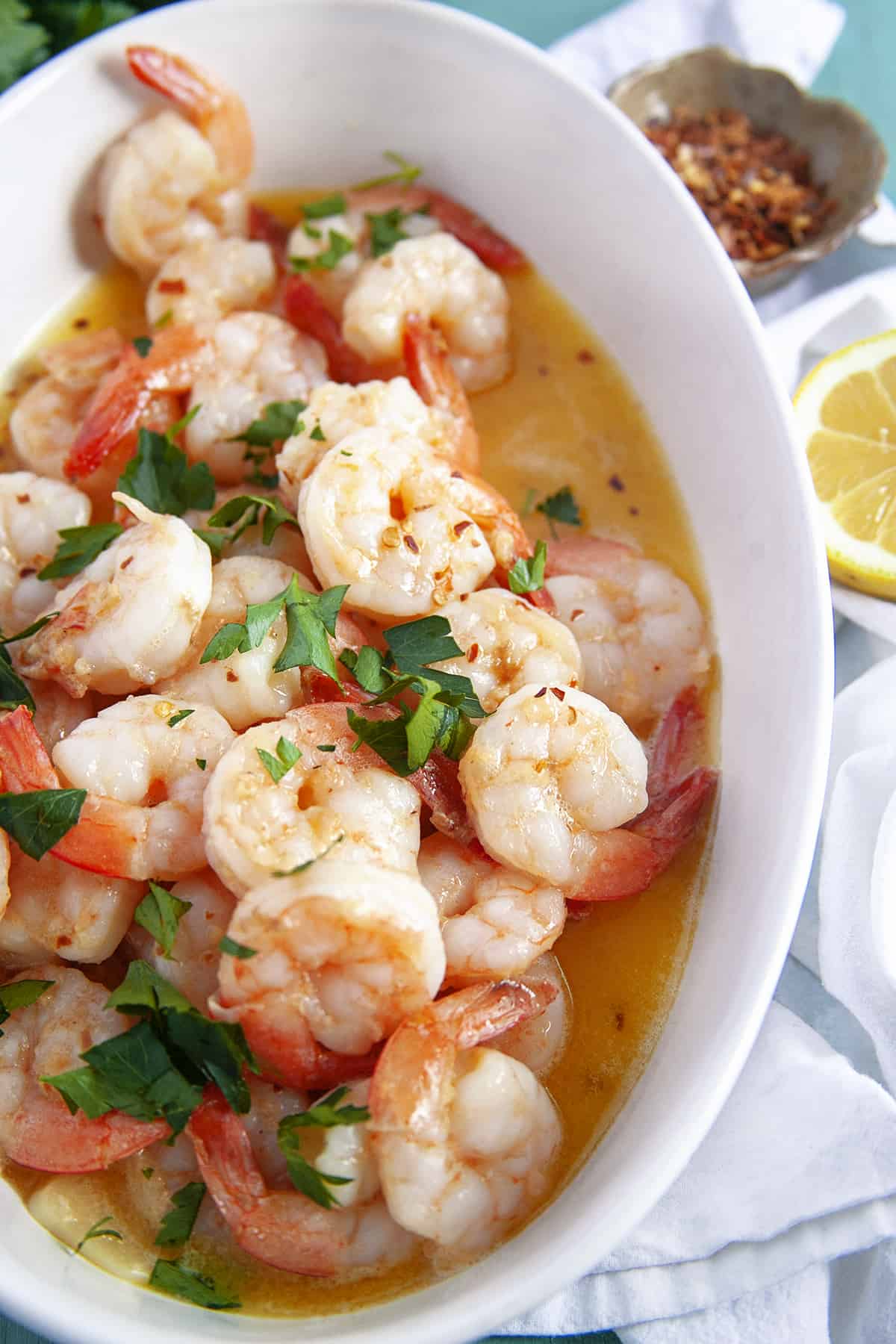 This Shrimp Scampi is a delicious dish to share for Valentine's Day or an anniversary. The succulent garlic butter shrimp are always a hit. Shrimp piled up in a casserole with lots of sauce.