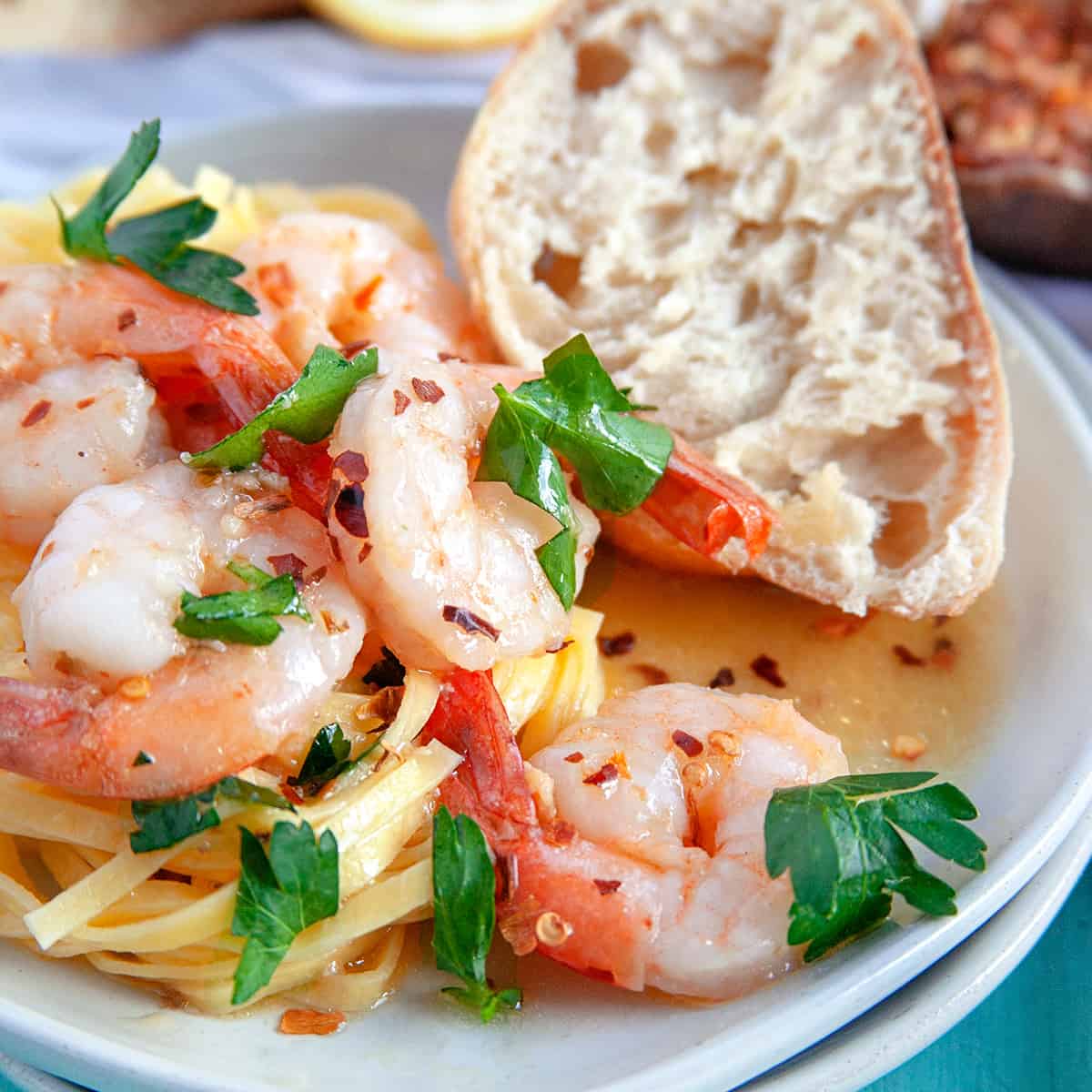 This Shrimp Scampi is a delicious dish to share for Valentine's Day or an anniversary. The succulent garlic butter shrimp are always a hit. Shrimp Scampi over pasta with artisan bread.