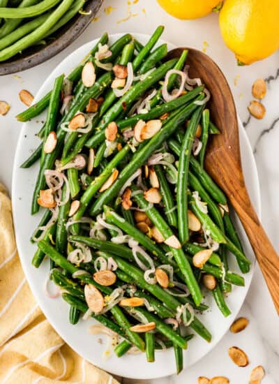Overhead shot of Green Beans Almondine on a platter.